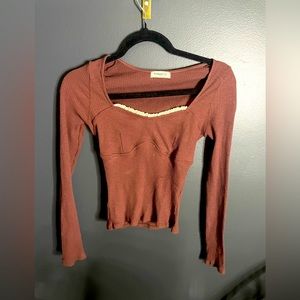 Burnt orange long sleeve top size S/M. Fitted. Gently used